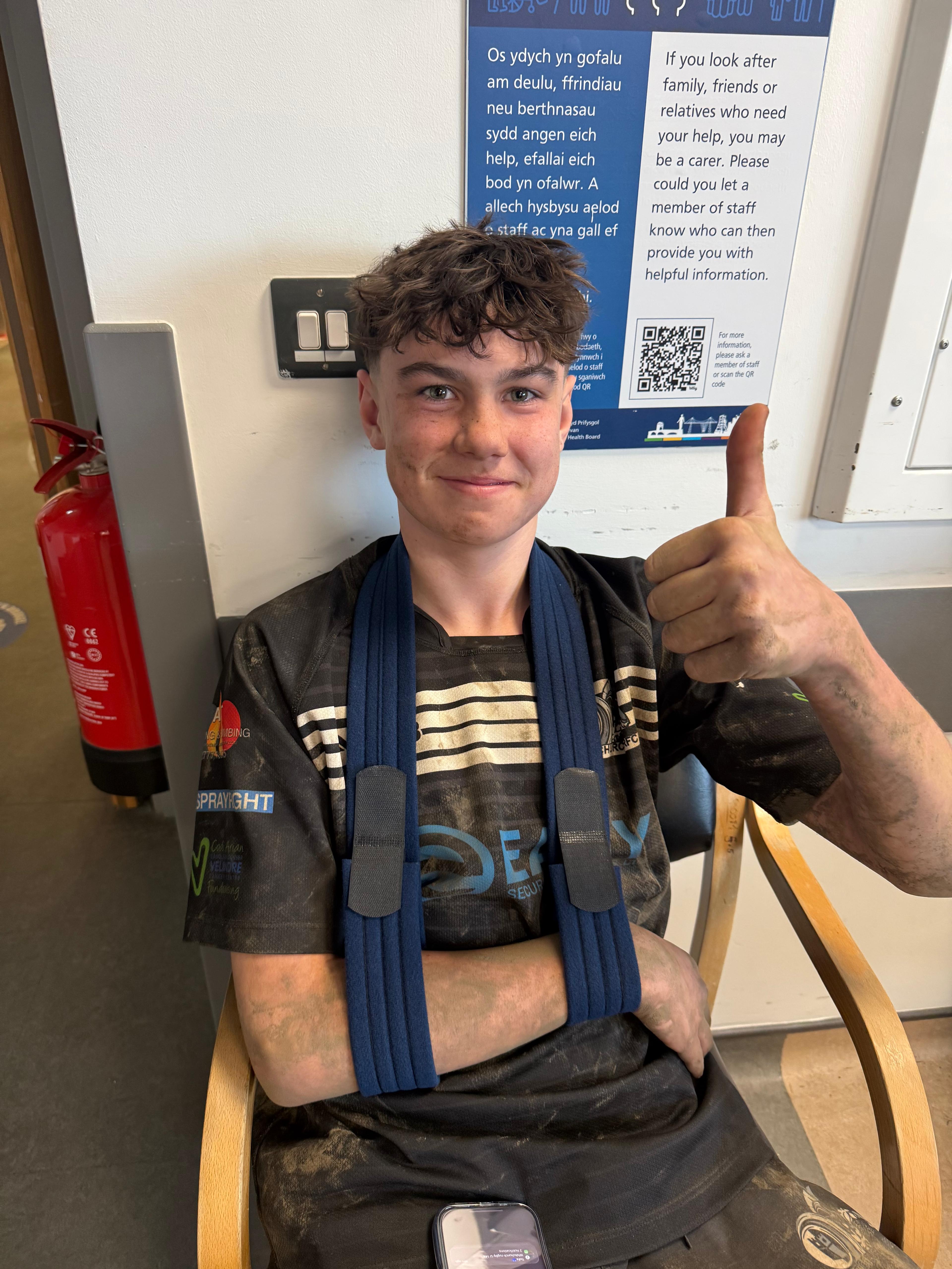 Whitchurch player gives thumbs up from A&E after the Machen game